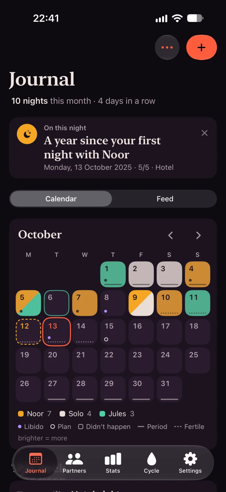 The Journal: an October calendar with nights lit in amber, ivory and green